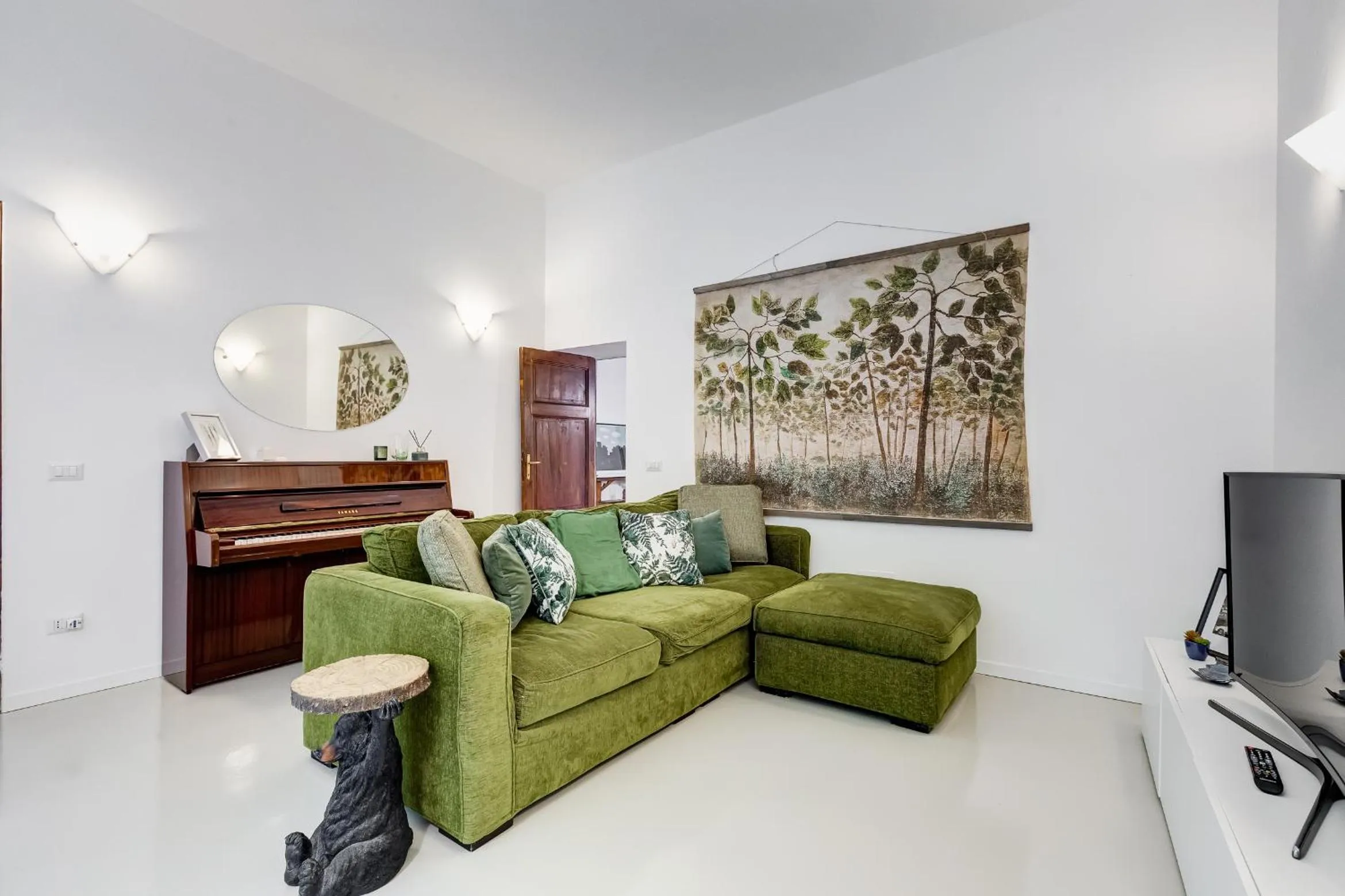 Communal lounge/ TV room in Colosseo Exclusive House by Premium Suites Collection