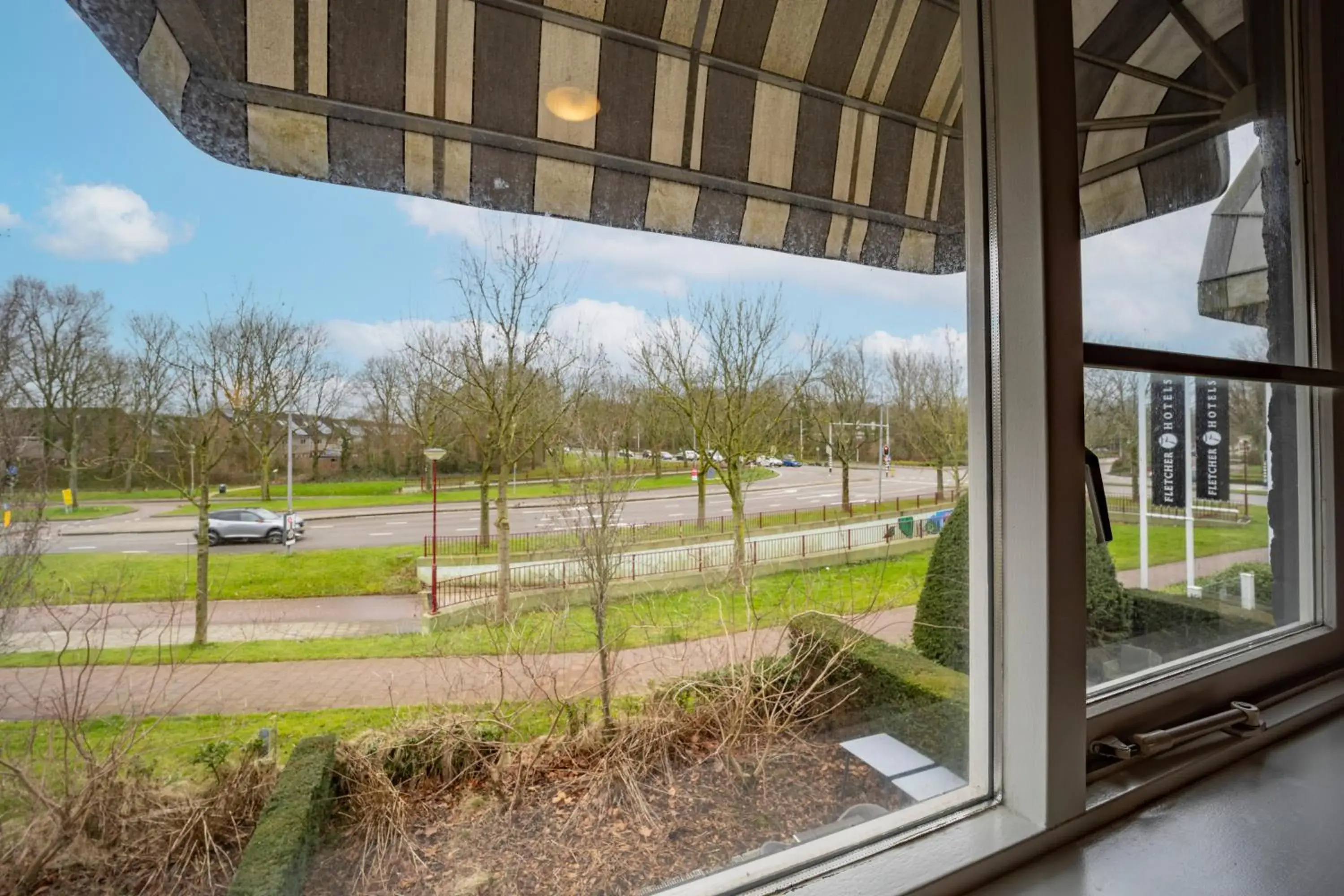 Property building in Fletcher Hotel-Restaurant Arneville-Middelburg Property building in Fletcher Hotel-Restaurant Arneville-Middelburg