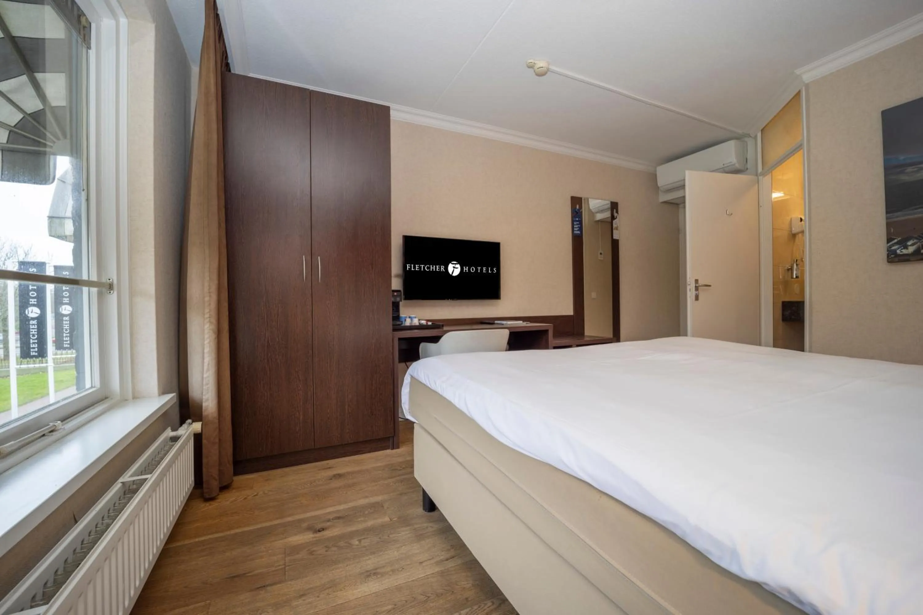 Photo of the whole room, Bed in Fletcher Hotel-Restaurant Arneville-Middelburg