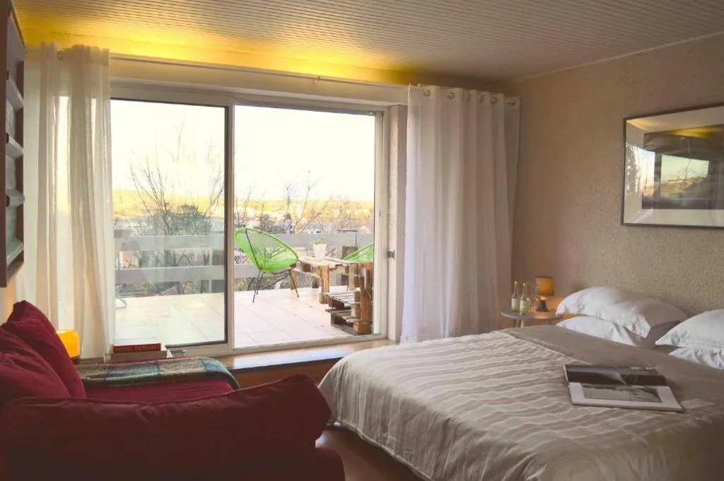 Bedroom, Bed in Casa mARTa : Suites, terrasses et vue panoramique