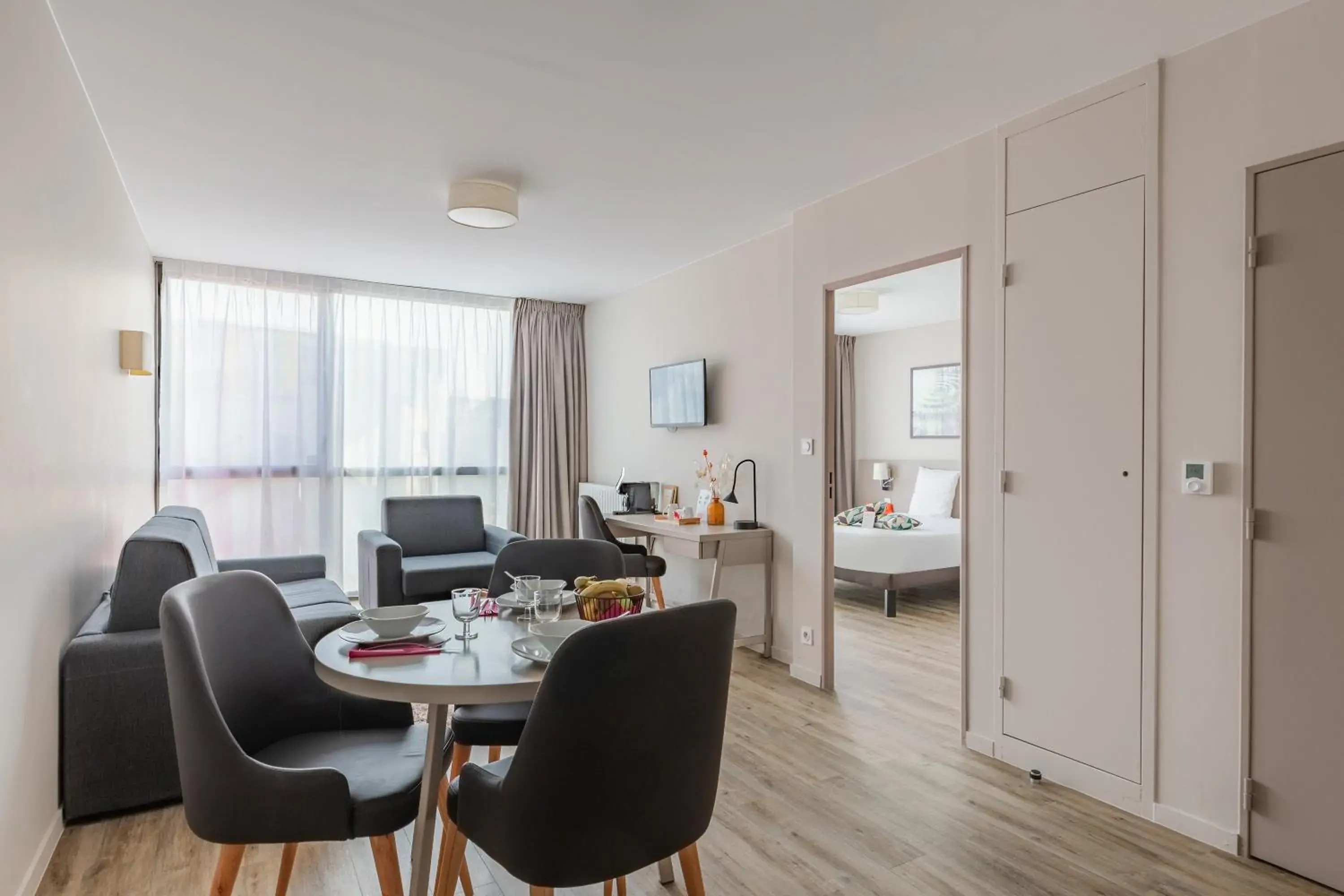 TV and multimedia, Bed in Appart’City Confort Rennes – Cesson Sévigné TV and multimedia, Bed in Appart’City Confort Rennes – Cesson Sévigné