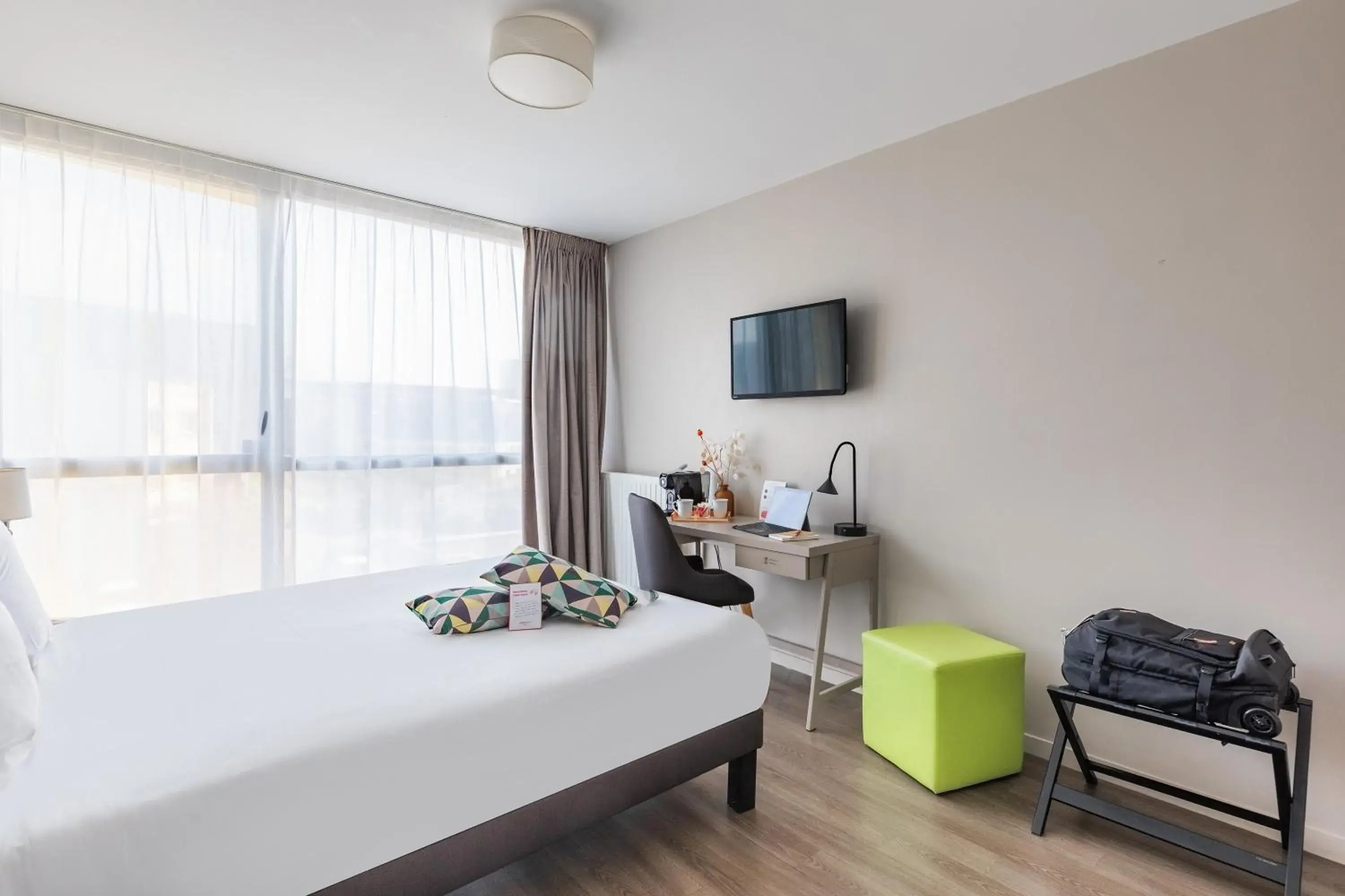 Bed in Appart’City Confort Rennes – Cesson Sévigné Bed in Appart’City Confort Rennes – Cesson Sévigné