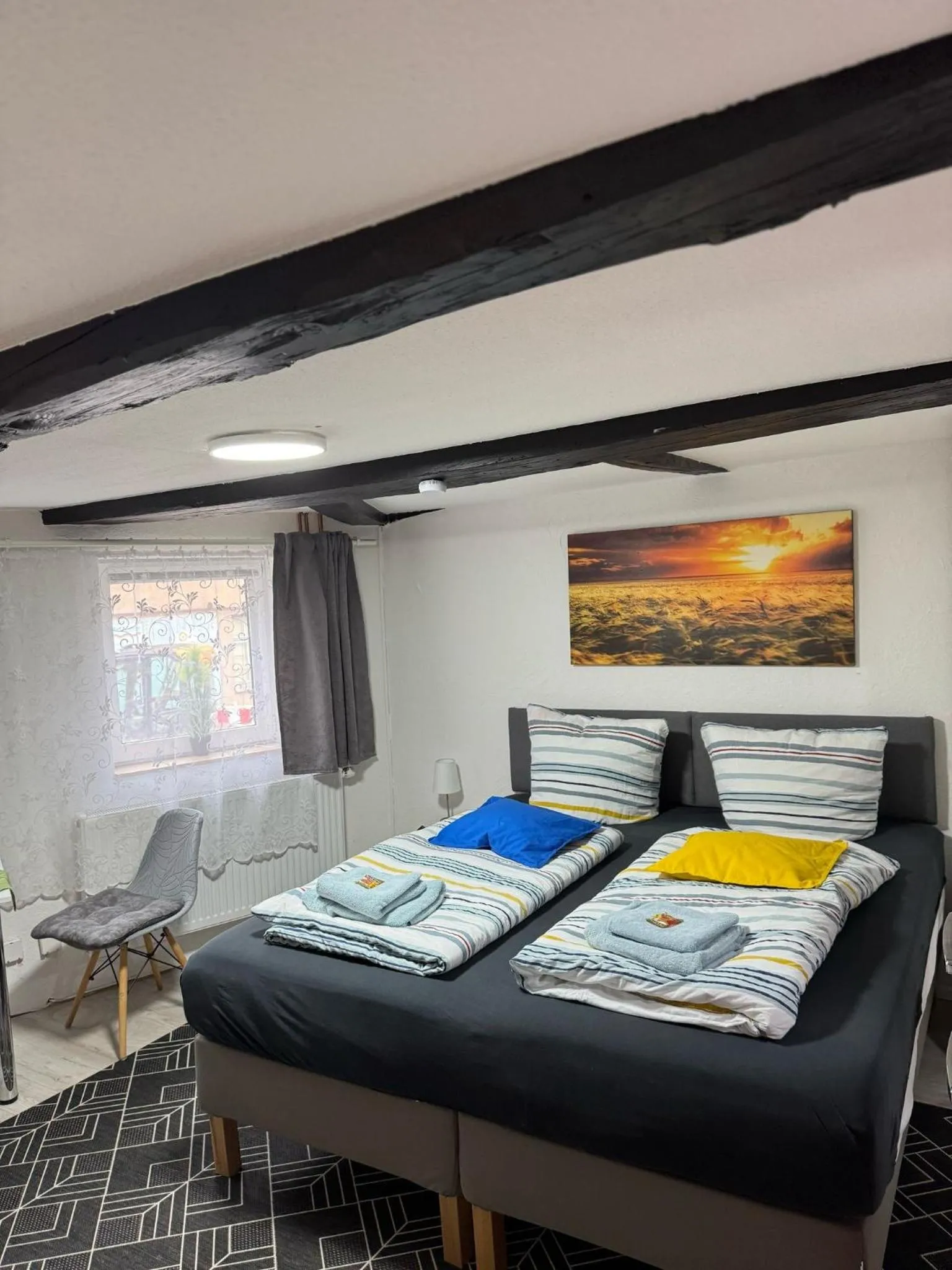 Bed in Ferienwohnung-Goldener Winkel