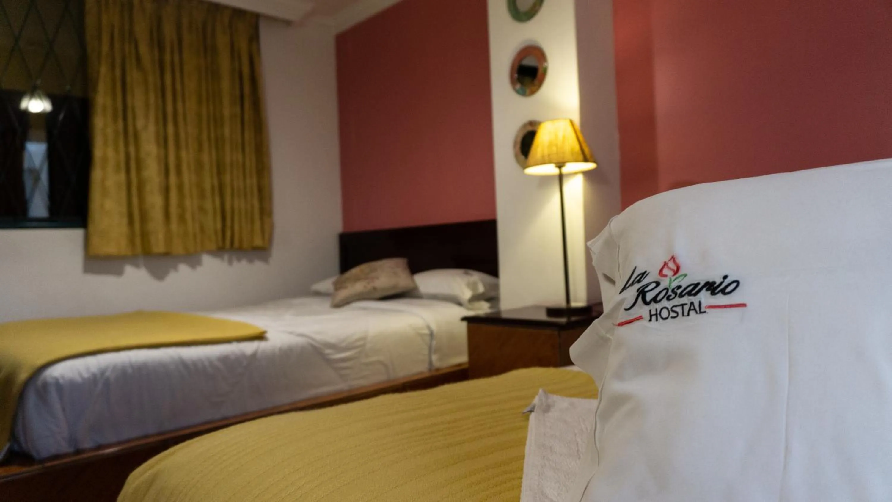 Bed in La Rosario Hostal