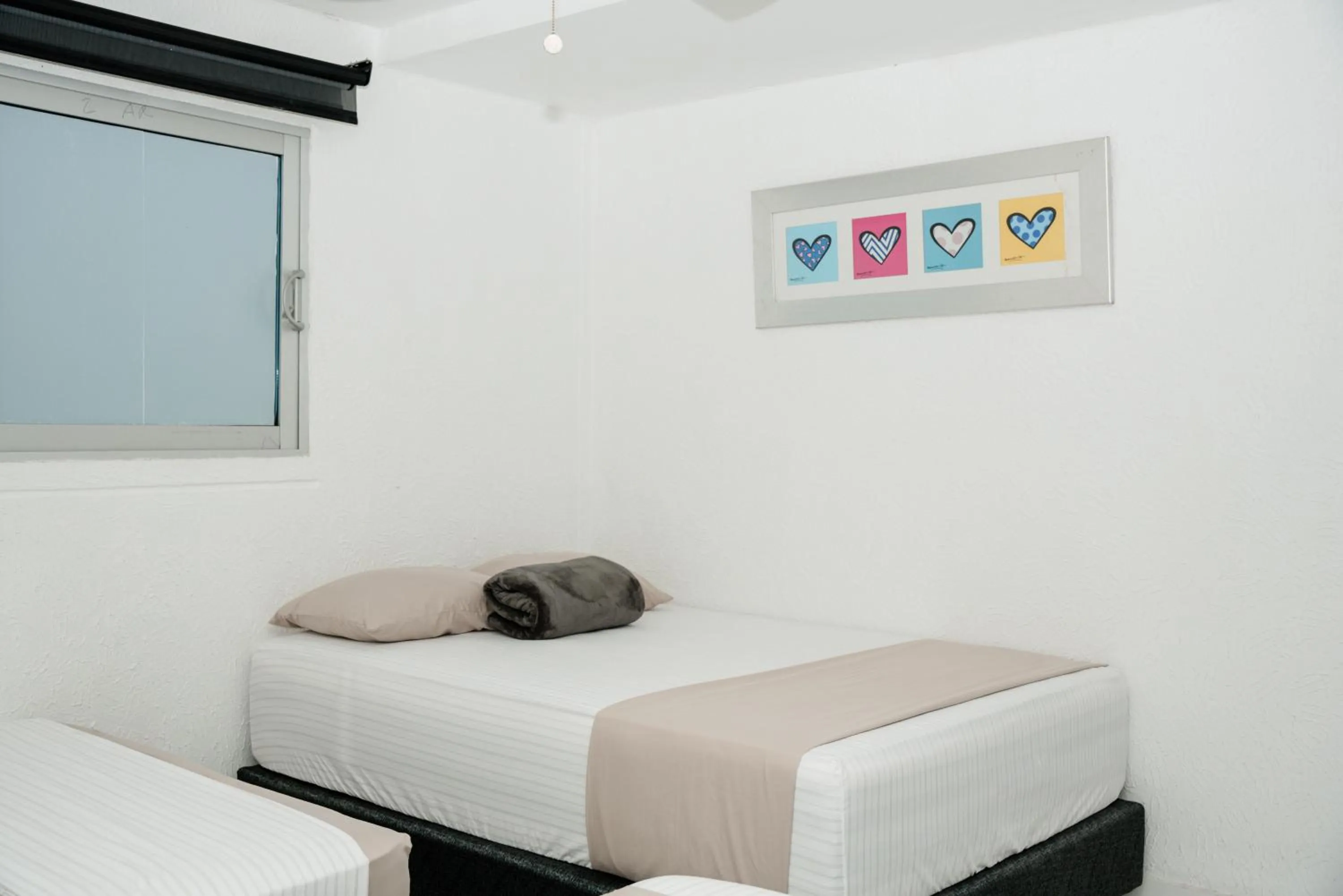 air conditioner, Bed in Hotel Kaamú Taganga