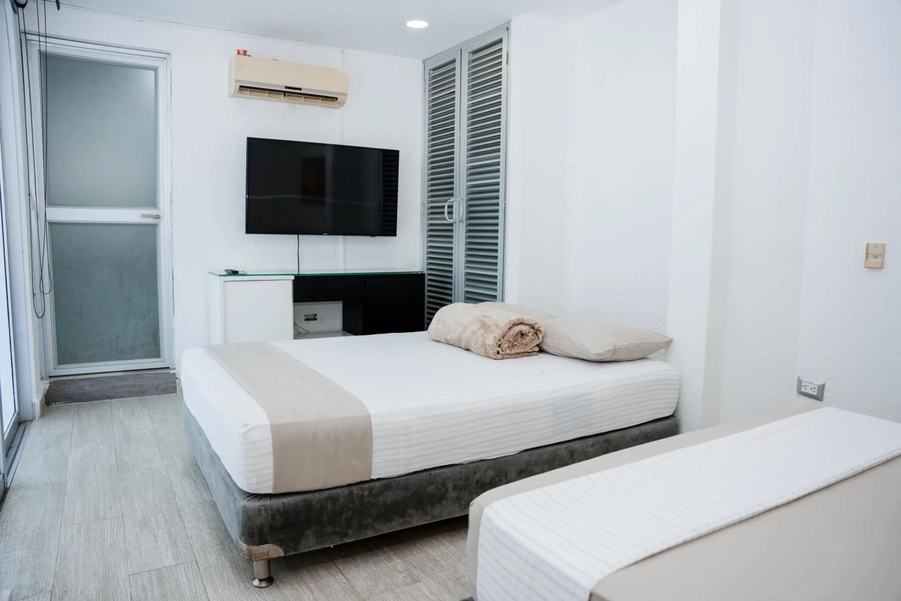 Bed in Hotel Kaamú Taganga