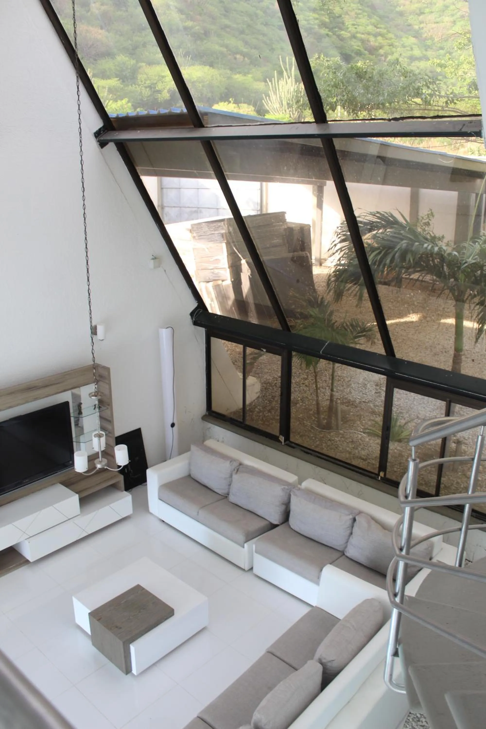 Communal lounge/ TV room in Hotel Kaamú Taganga