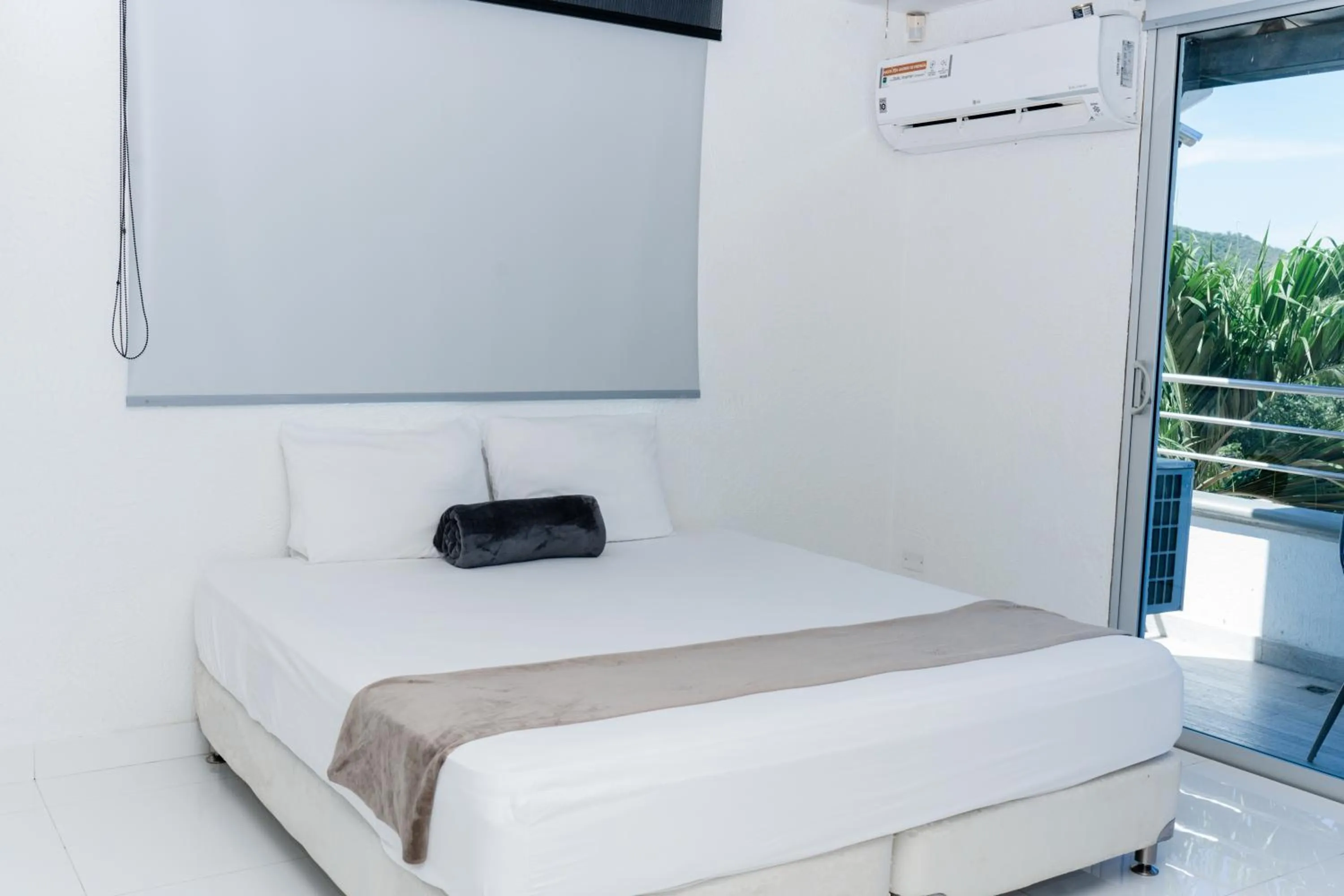 Bed in Hotel Kaamú Taganga