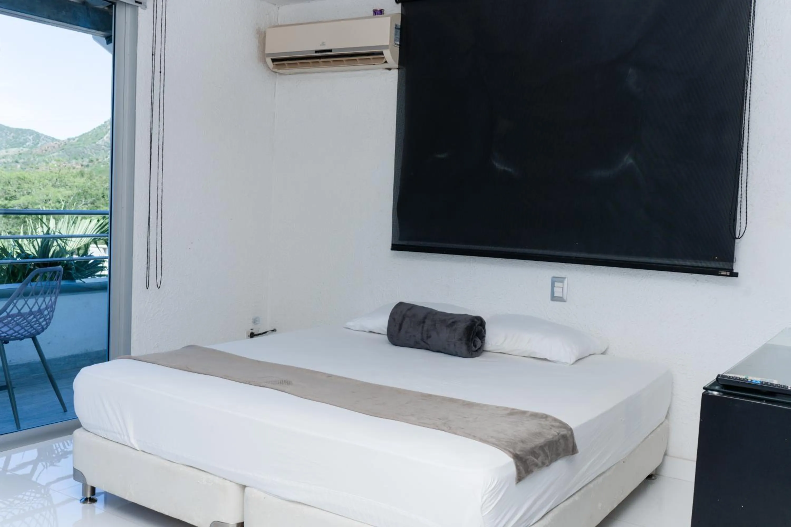 Photo of the whole room, Bed in Hotel Kaamú Taganga