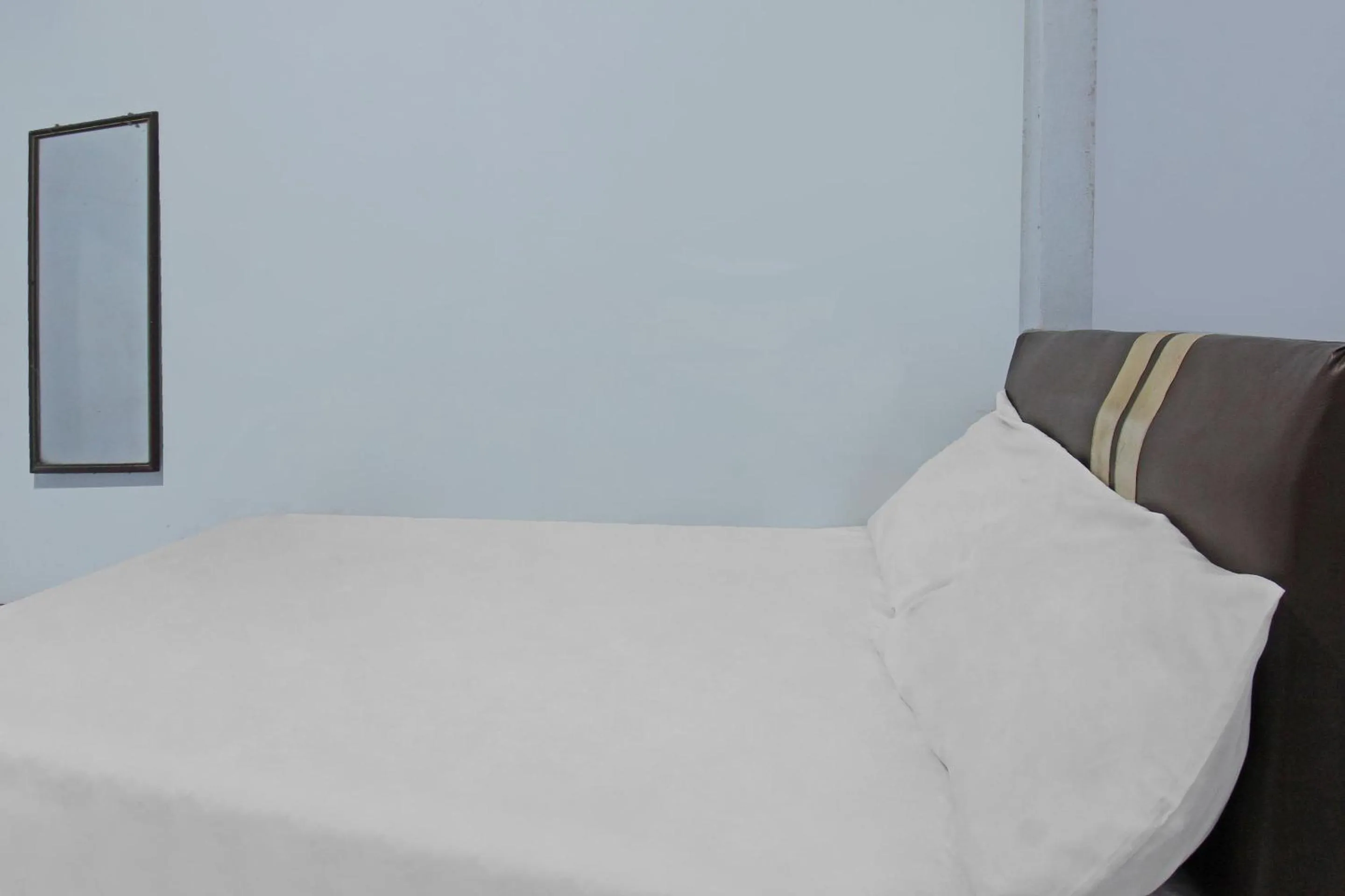 Bedroom, Bed in Hotel O Jati Homestay Near Taman Suranadi