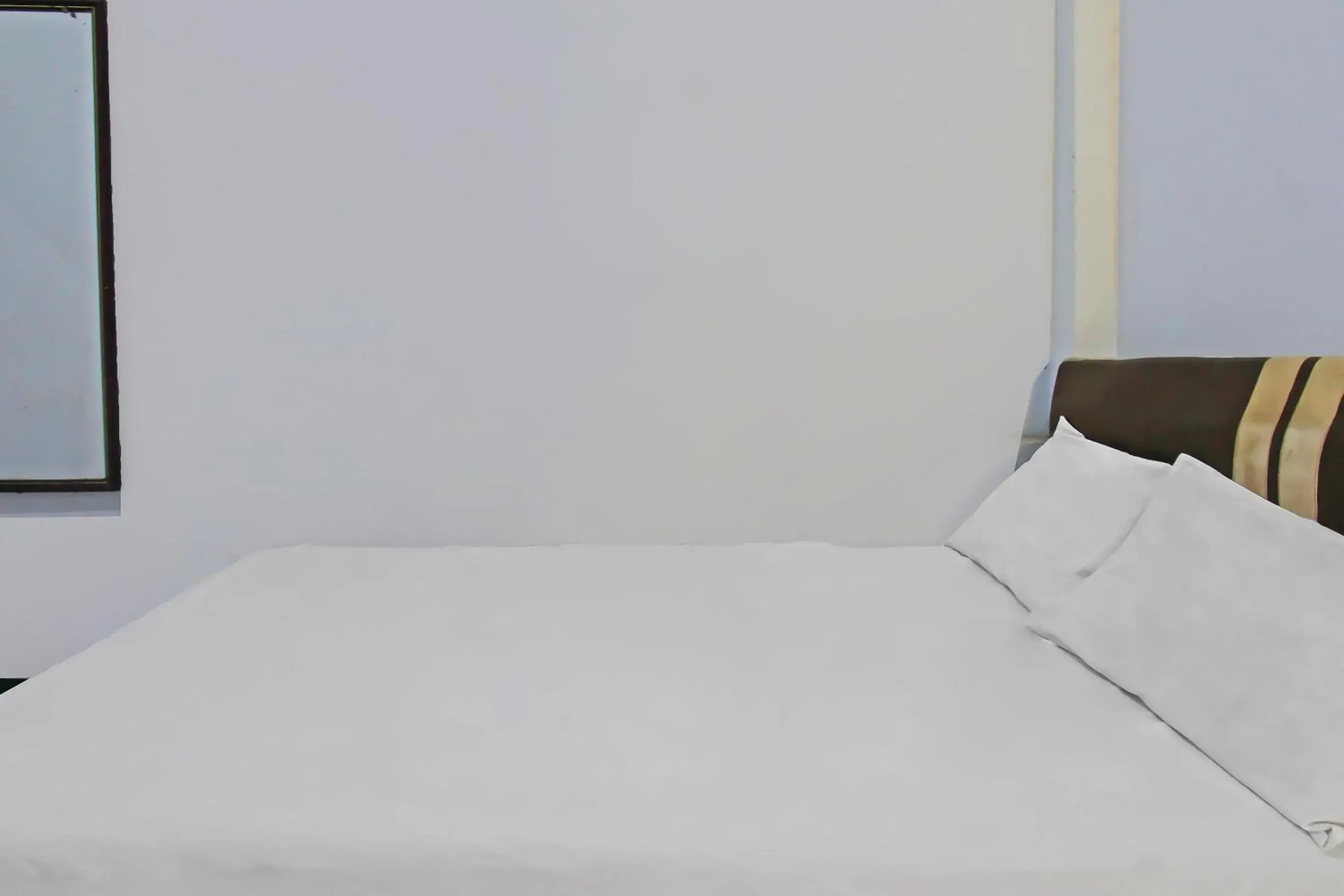 Bedroom, Bed in Hotel O Jati Homestay Near Taman Suranadi Bedroom, Bed in Hotel O Jati Homestay Near Taman Suranadi