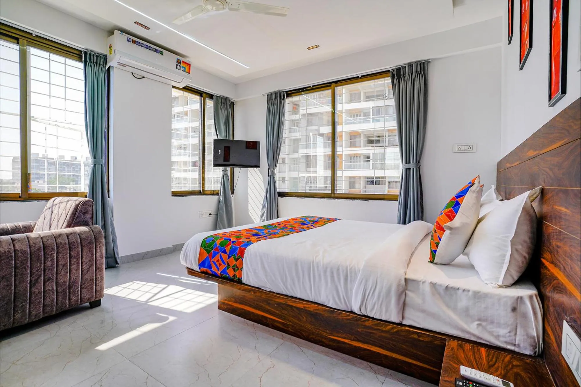 Communal lounge/ TV room, Bed in FabHotel Crystal Inn - Nr Suvarndeep Chowk