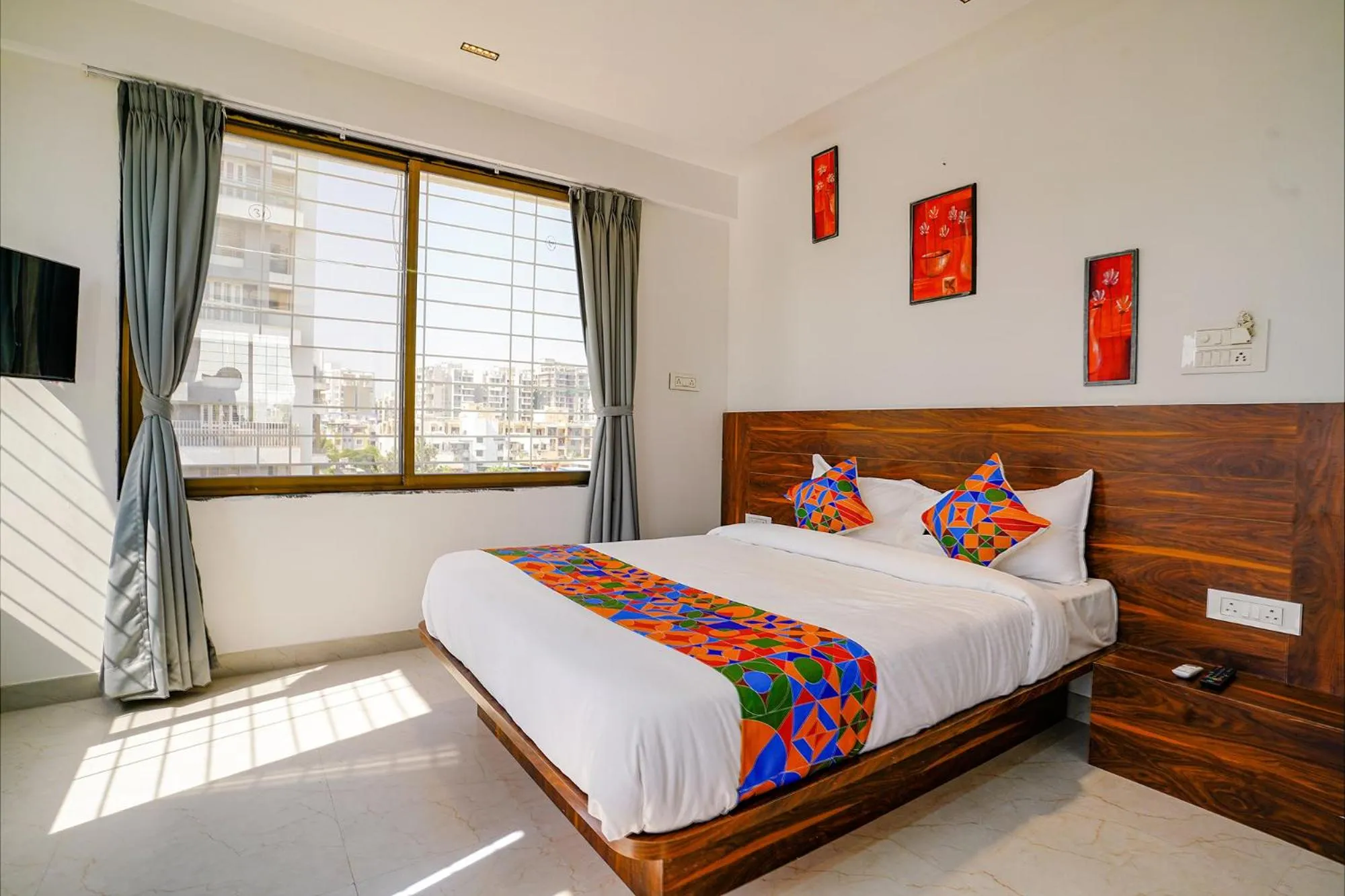 Communal lounge/ TV room, Bed in FabHotel Crystal Inn - Nr Suvarndeep Chowk