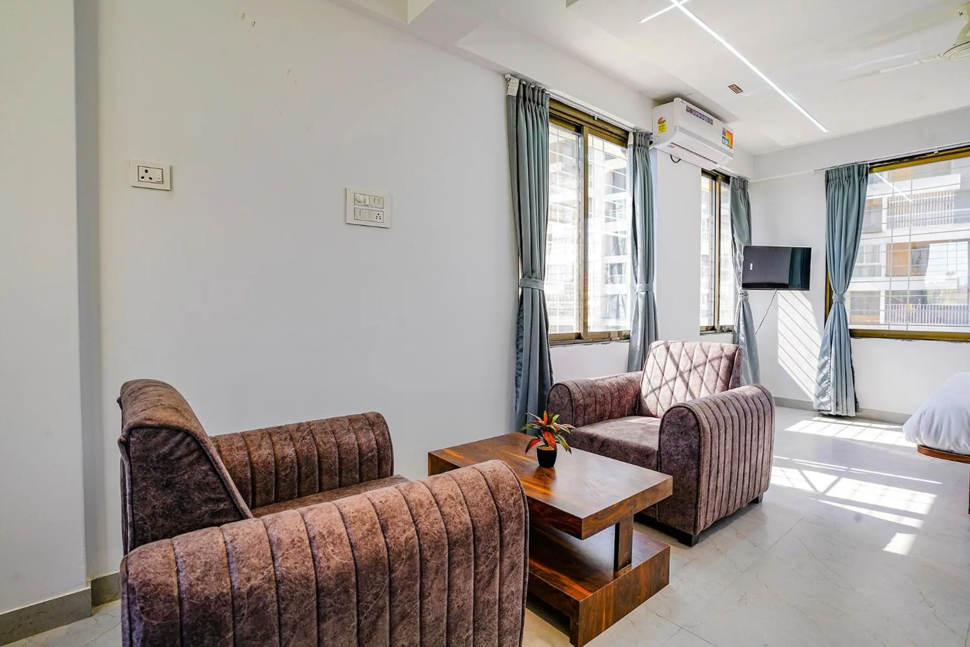 TV and multimedia in FabHotel Crystal Inn - Nr Suvarndeep Chowk