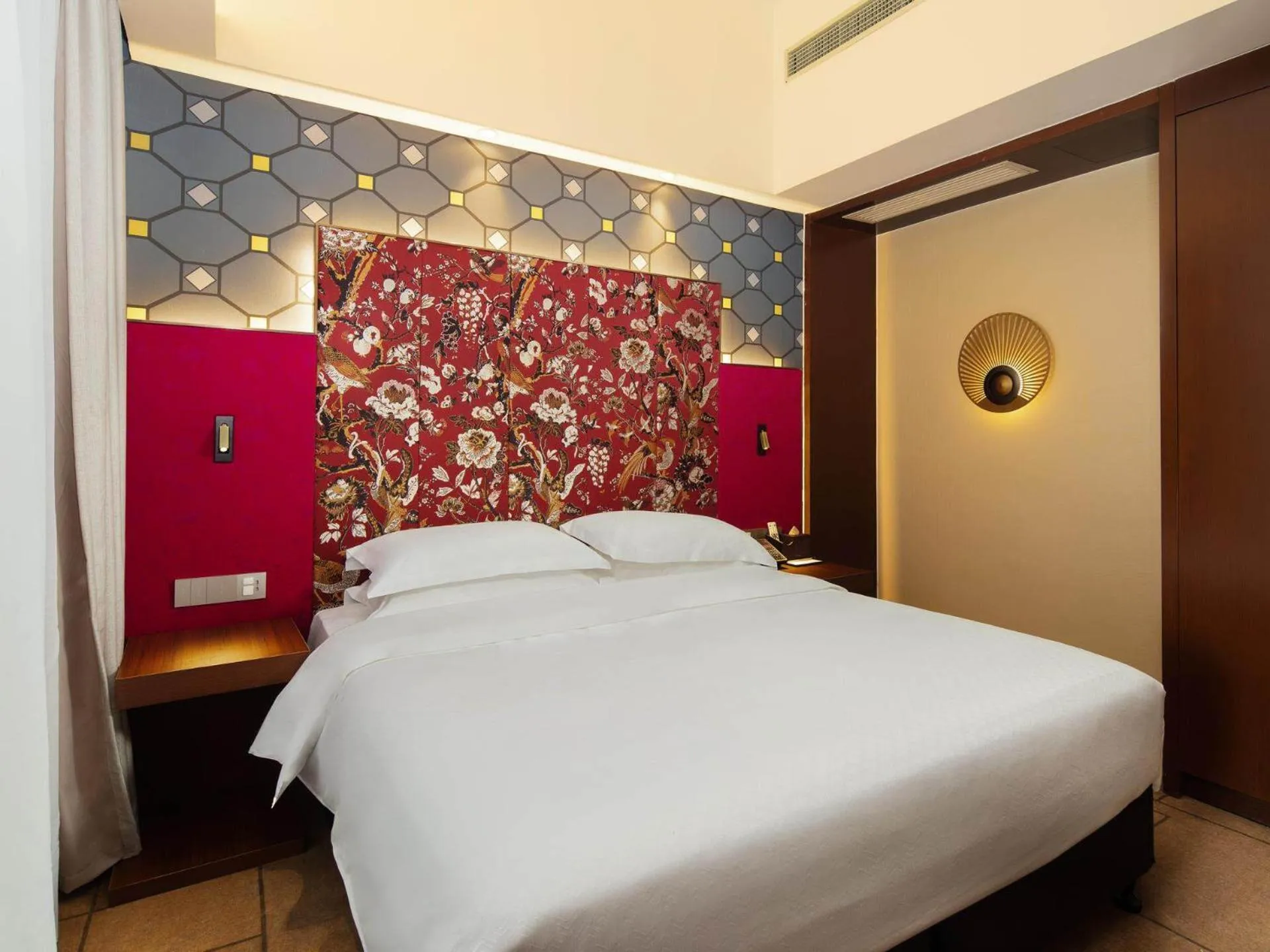 Bed in Metropolo Hotel Zhenjia Wanda Plaza Railway Station