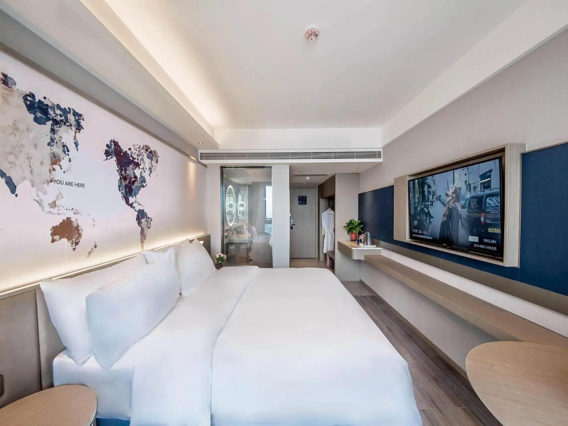 Bed in Kyriad Marvelous Hotel Qinhuangdao Nandaihe Bed in Kyriad Marvelous Hotel Qinhuangdao Nandaihe