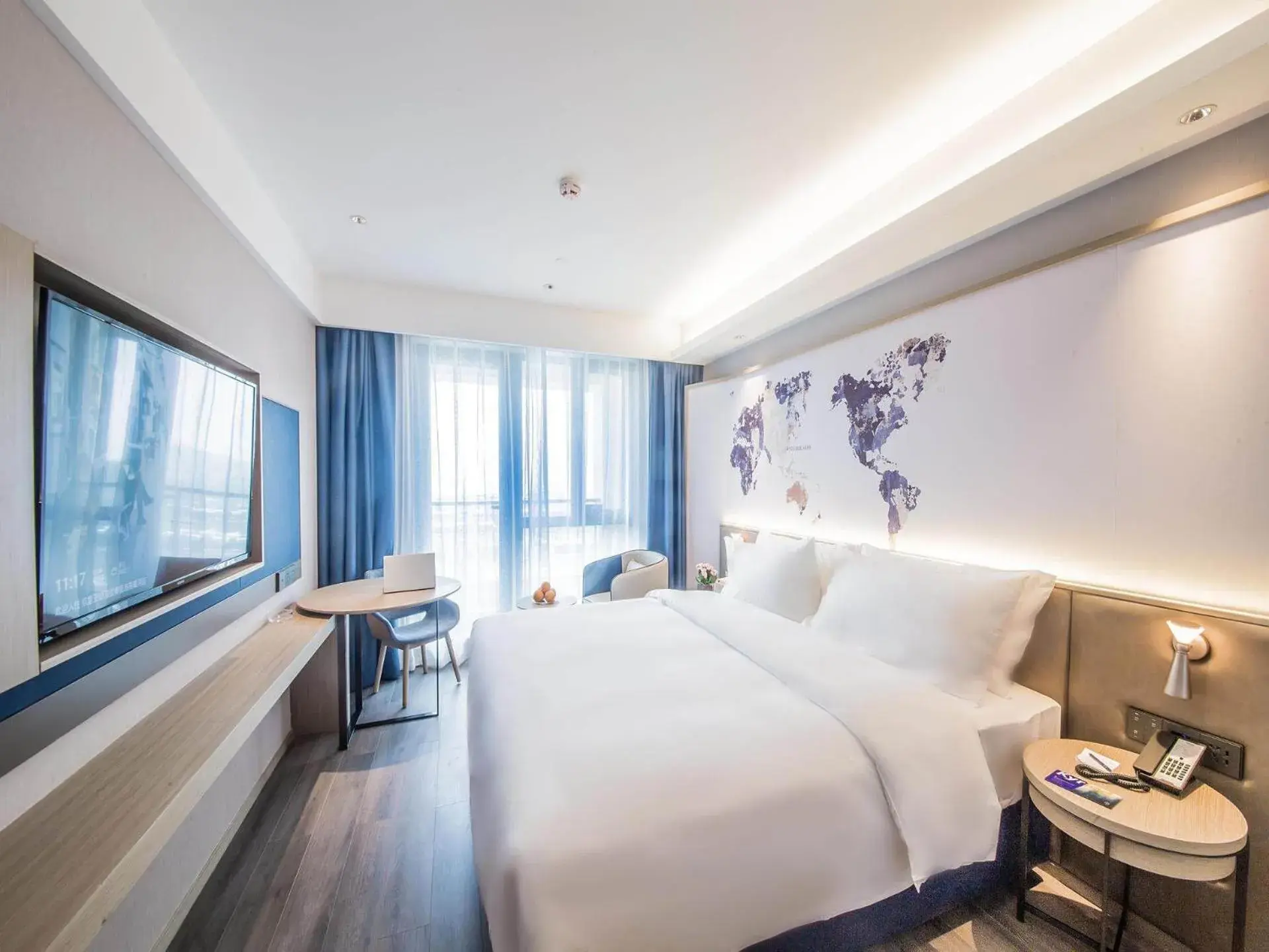 Bed in Kyriad Marvelous Hotel Qinhuangdao Nandaihe Bed in Kyriad Marvelous Hotel Qinhuangdao Nandaihe