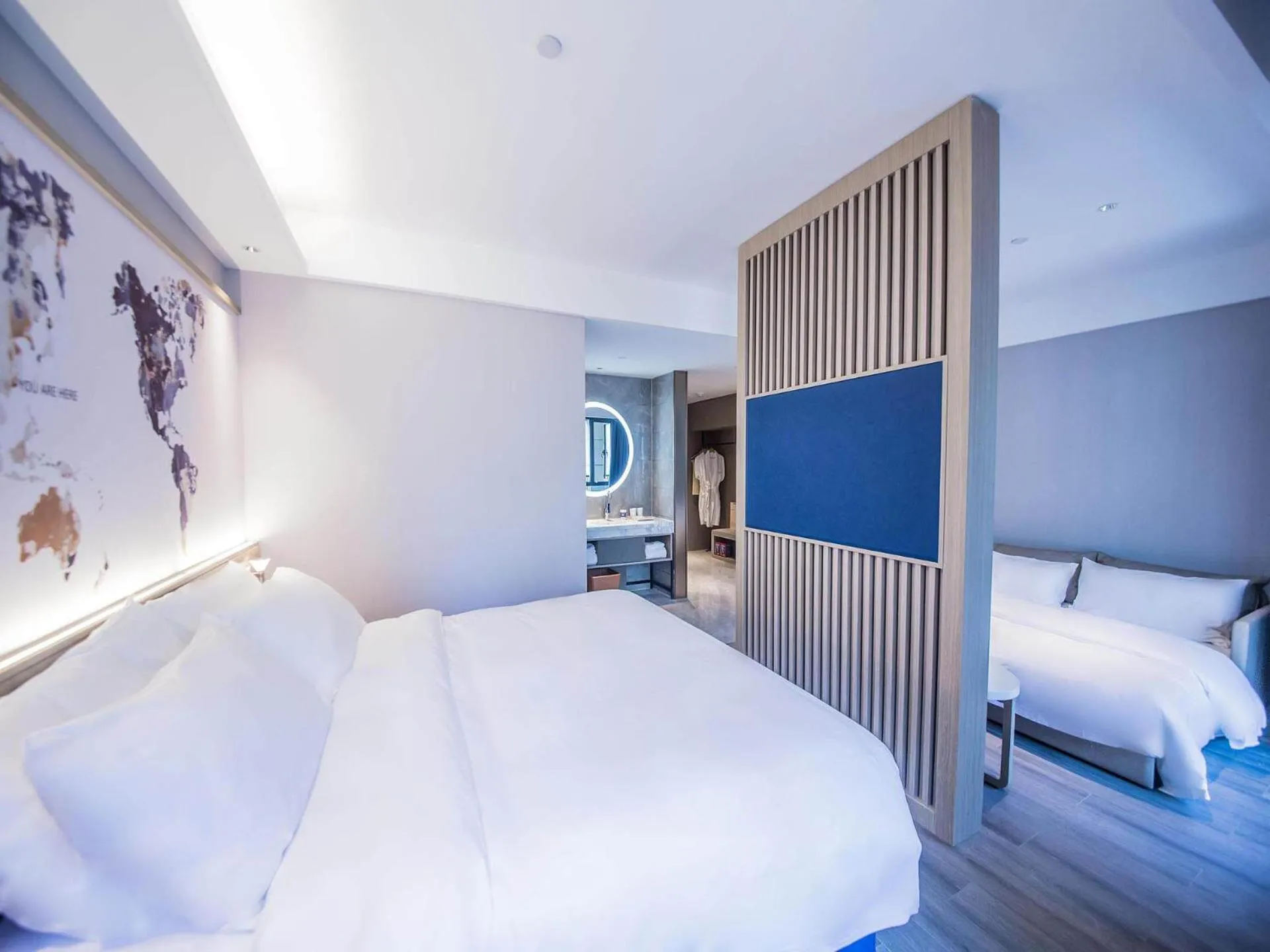 Bed in Kyriad Marvelous Hotel Qinhuangdao Nandaihe