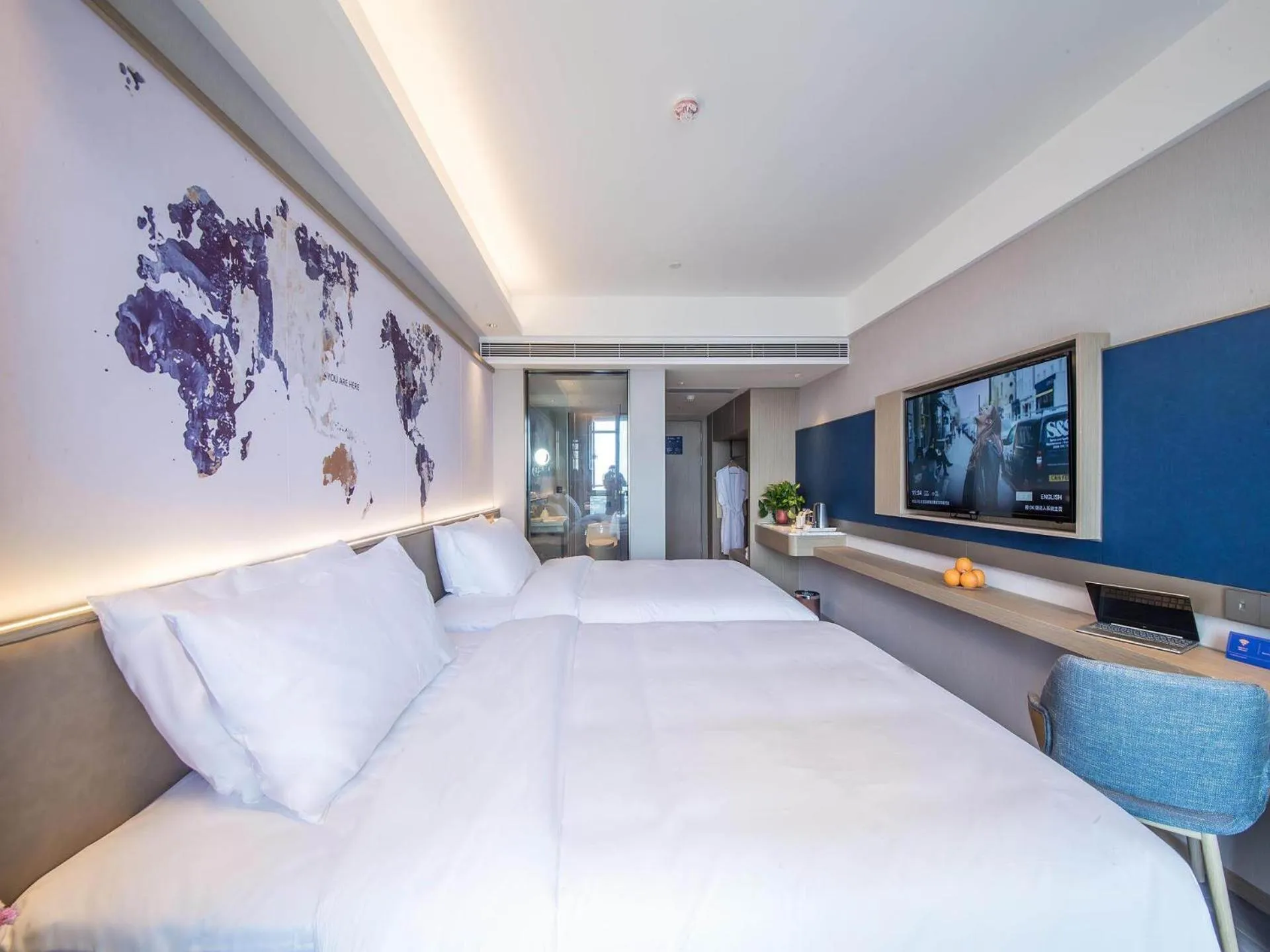 Bed in Kyriad Marvelous Hotel Qinhuangdao Nandaihe