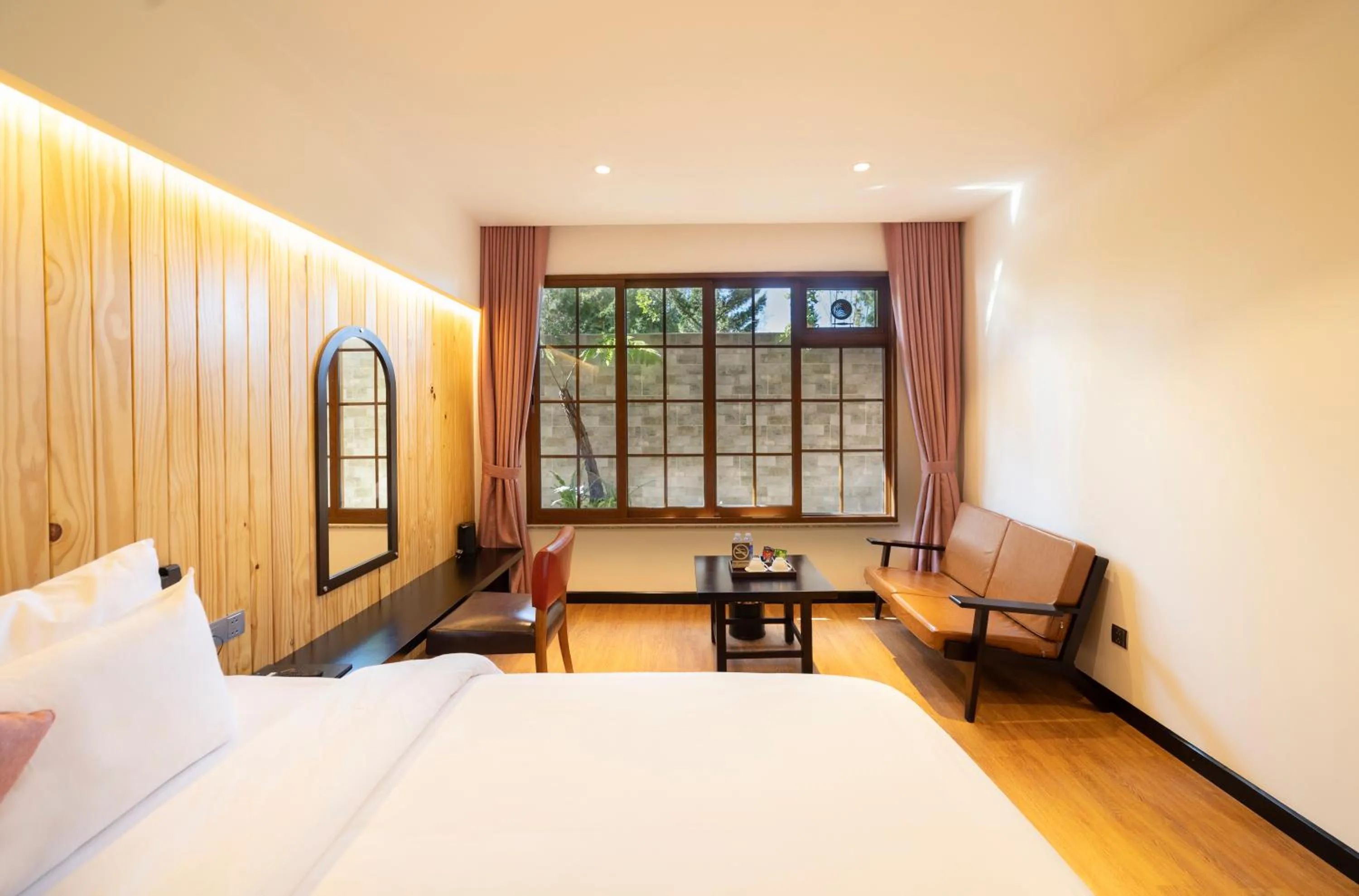 Bed in Brick House Dalat Hotel