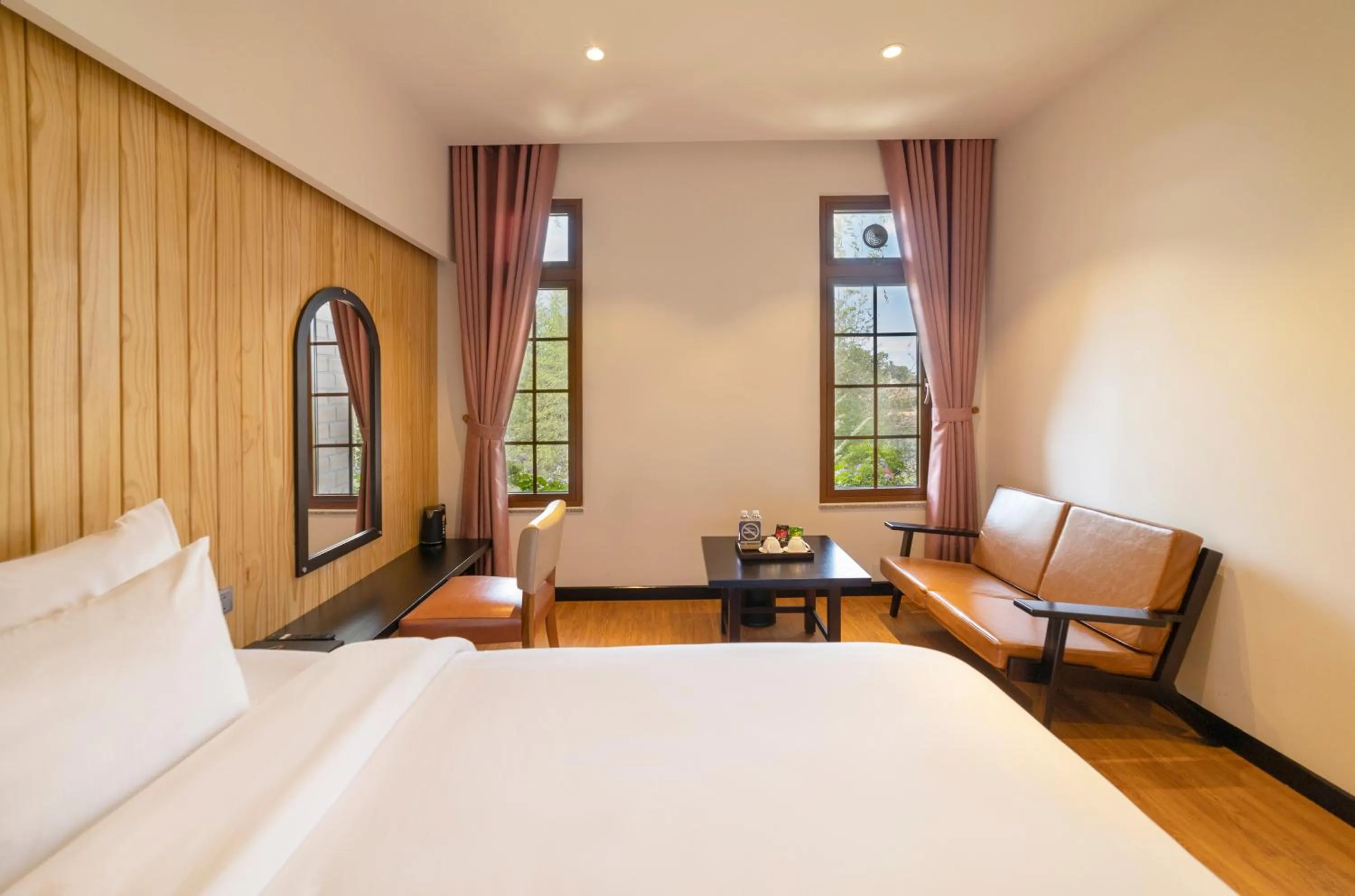 Bed in Brick House Dalat Hotel