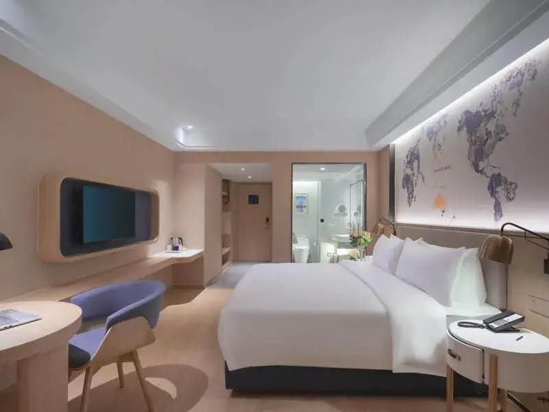 Bed in Kyriad Marvelous Hotel Suzhou Wujiang People Square Bed in Kyriad Marvelous Hotel Suzhou Wujiang People Square