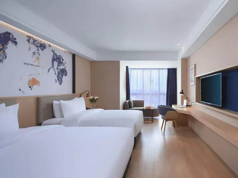 Bed in Kyriad Marvelous Hotel Suzhou Wujiang People Square Bed in Kyriad Marvelous Hotel Suzhou Wujiang People Square