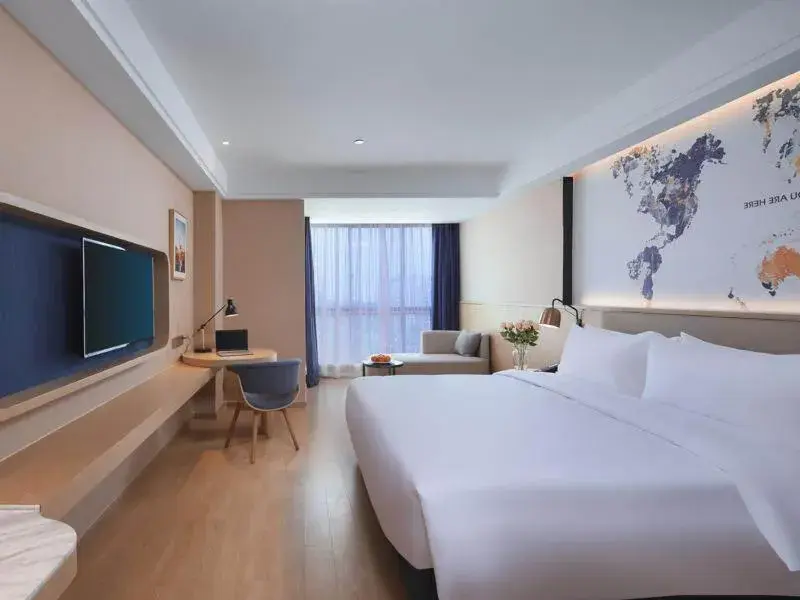 Bed in Kyriad Marvelous Hotel Suzhou Wujiang People Square Bed in Kyriad Marvelous Hotel Suzhou Wujiang People Square