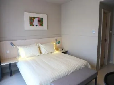 Bed in Jinjiang Inn Yangzhou Gaoyou East Haichao Road