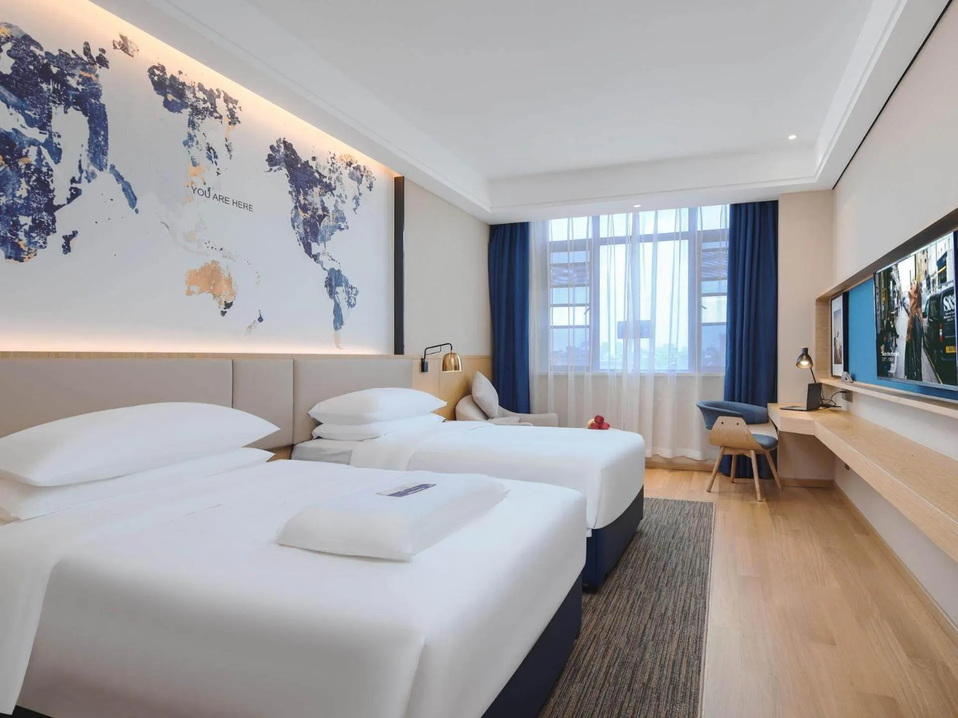 Bed in Kyriad Marvelous Hotel Bozhou Wanda Plaza