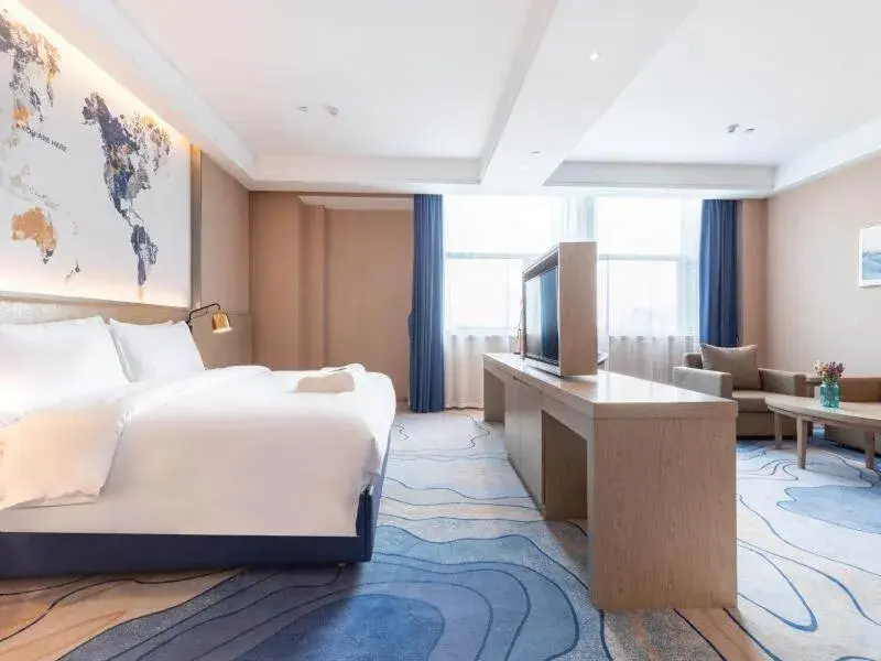 Bed in Kyriad Marvelous Hotel Shouguang Municipal Government Bed in Kyriad Marvelous Hotel Shouguang Municipal Government