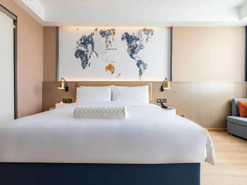 Bed in Kyriad Marvelous Hotel Shouguang Municipal Government Bed in Kyriad Marvelous Hotel Shouguang Municipal Government