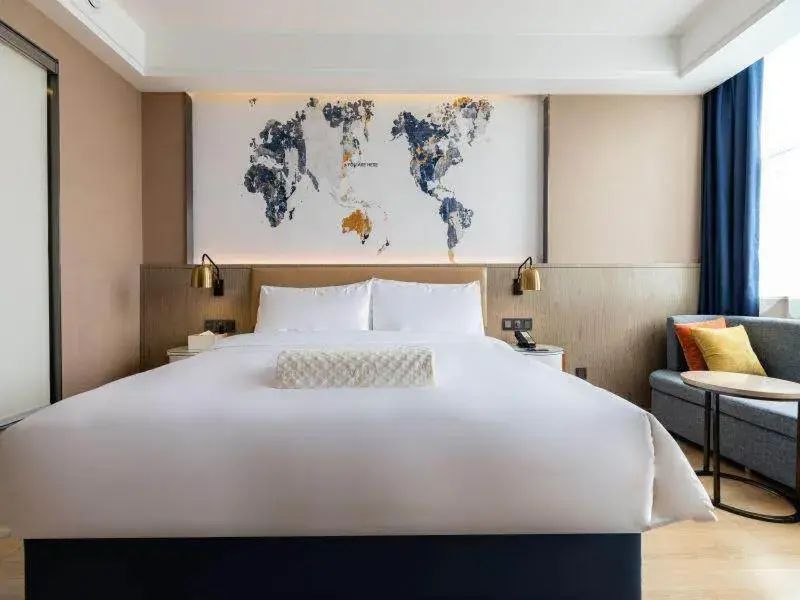 Bed in Kyriad Marvelous Hotel Shouguang Municipal Government Bed in Kyriad Marvelous Hotel Shouguang Municipal Government