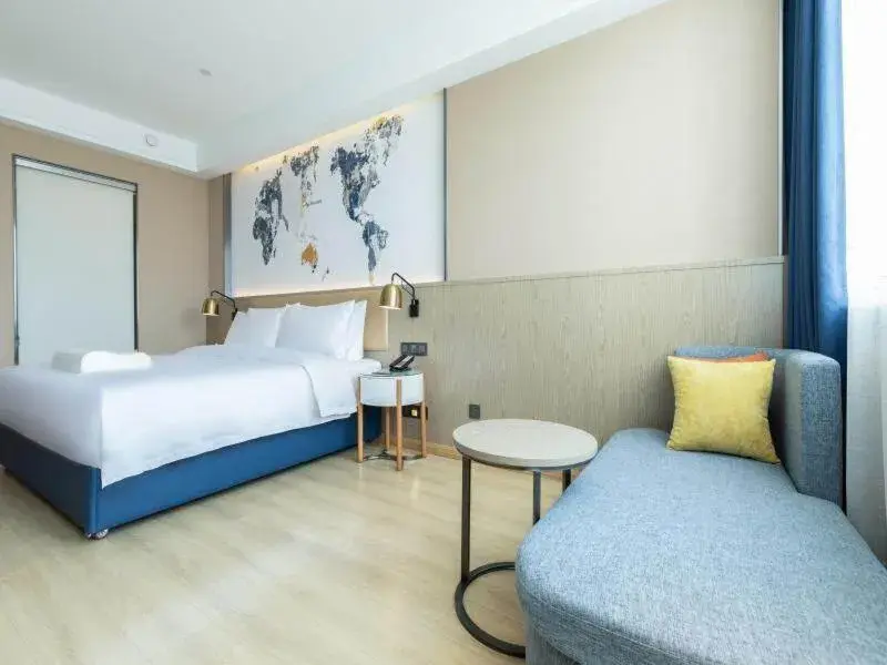 Bed in Kyriad Marvelous Hotel Shouguang Municipal Government Bed in Kyriad Marvelous Hotel Shouguang Municipal Government