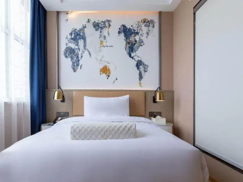 Bed in Kyriad Marvelous Hotel Shouguang Municipal Government Bed in Kyriad Marvelous Hotel Shouguang Municipal Government