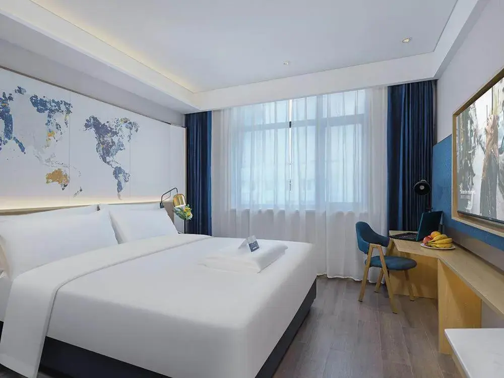 Bed in Kyriad Marvelous Hotel Weihai Happy Gate Weigao Plaza Bed in Kyriad Marvelous Hotel Weihai Happy Gate Weigao Plaza