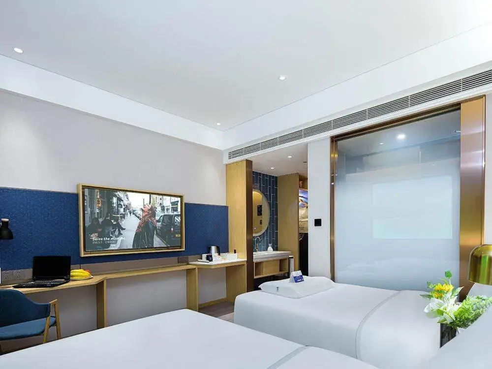 Bed in Kyriad Marvelous Hotel Weihai Happy Gate Weigao Plaza Bed in Kyriad Marvelous Hotel Weihai Happy Gate Weigao Plaza