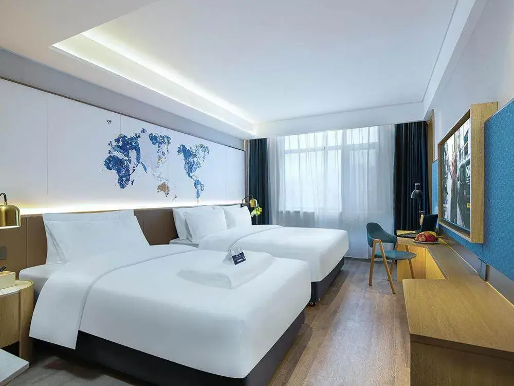 Bed in Kyriad Marvelous Hotel Weihai Happy Gate Weigao Plaza Bed in Kyriad Marvelous Hotel Weihai Happy Gate Weigao Plaza