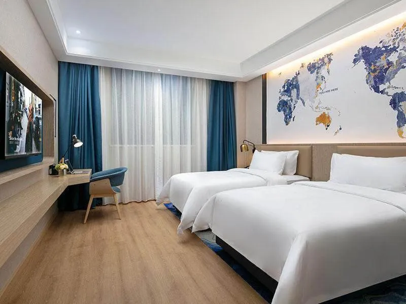 Bed in Kyriad Marvelous Hotel Changde Pedestrian Street