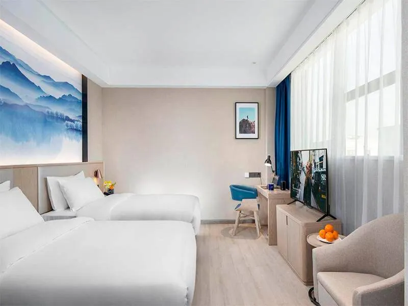 Bed in Kyriad Hotel Luoyang Longmen Railway Station