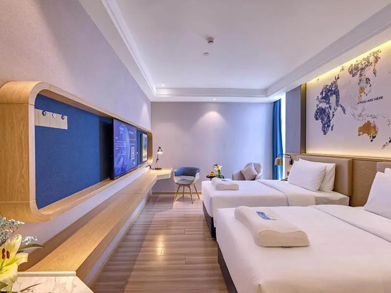 Bed in Kyriad Marvelous Hotel Guangzhou Baiyun International Airport