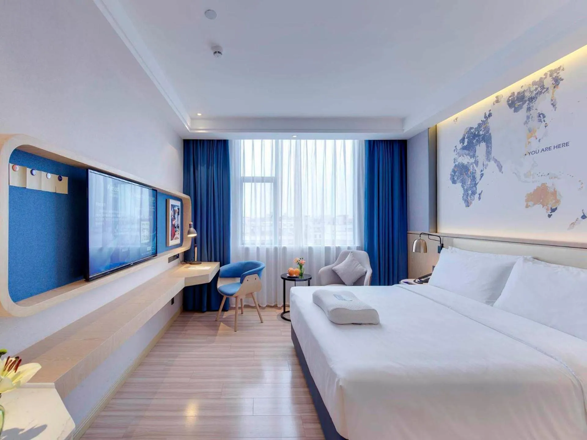 Bed in Kyriad Marvelous Hotel Guangzhou Baiyun International Airport