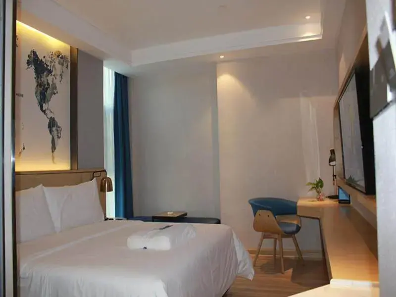 Bed in Kyriad Marvelous Hotel Guangzhou Baiyun International Airport Bed in Kyriad Marvelous Hotel Guangzhou Baiyun International Airport
