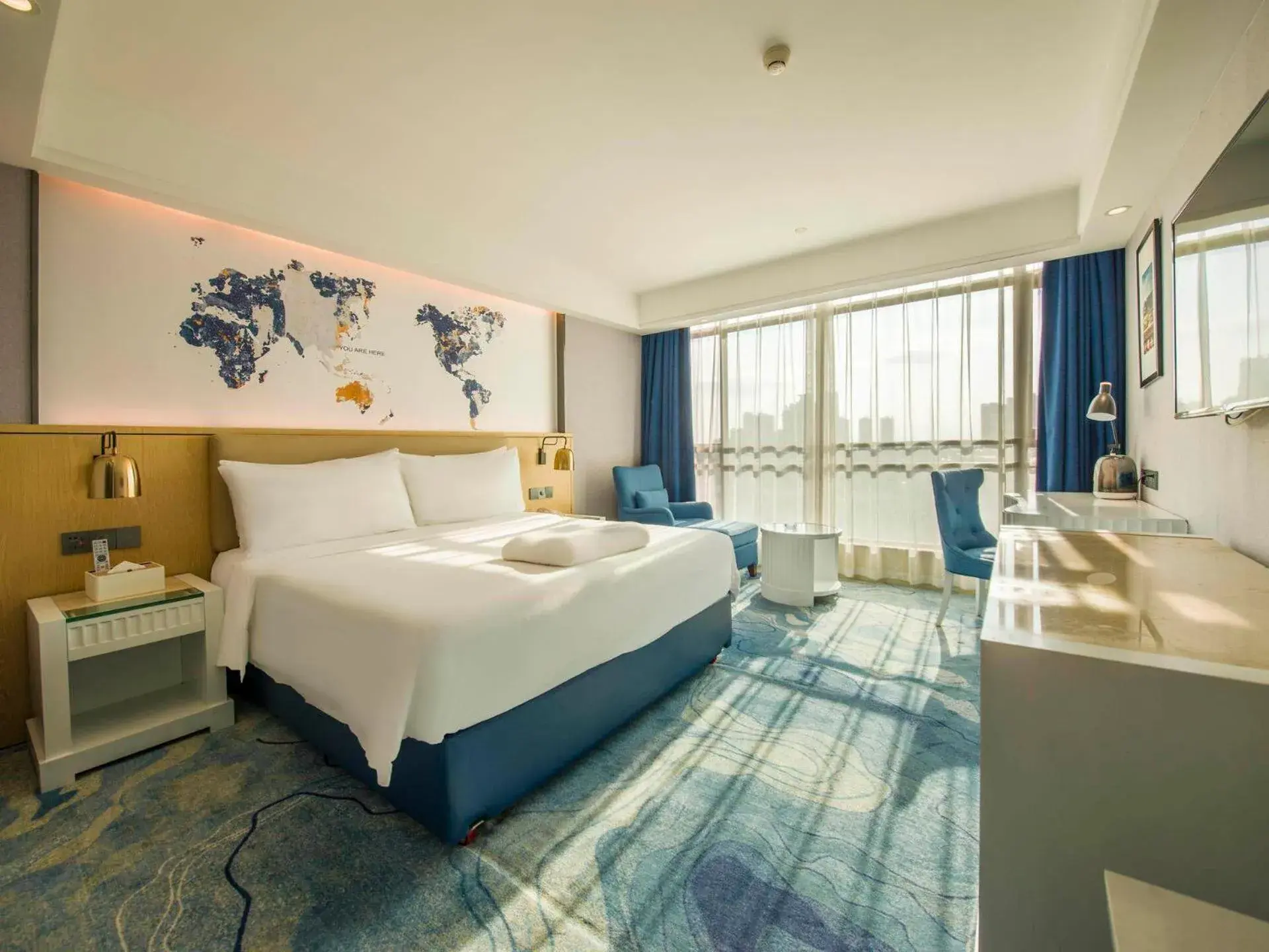 Bed in Kyriad Marvelous Hotel Qingyuan City Square Bed in Kyriad Marvelous Hotel Qingyuan City Square