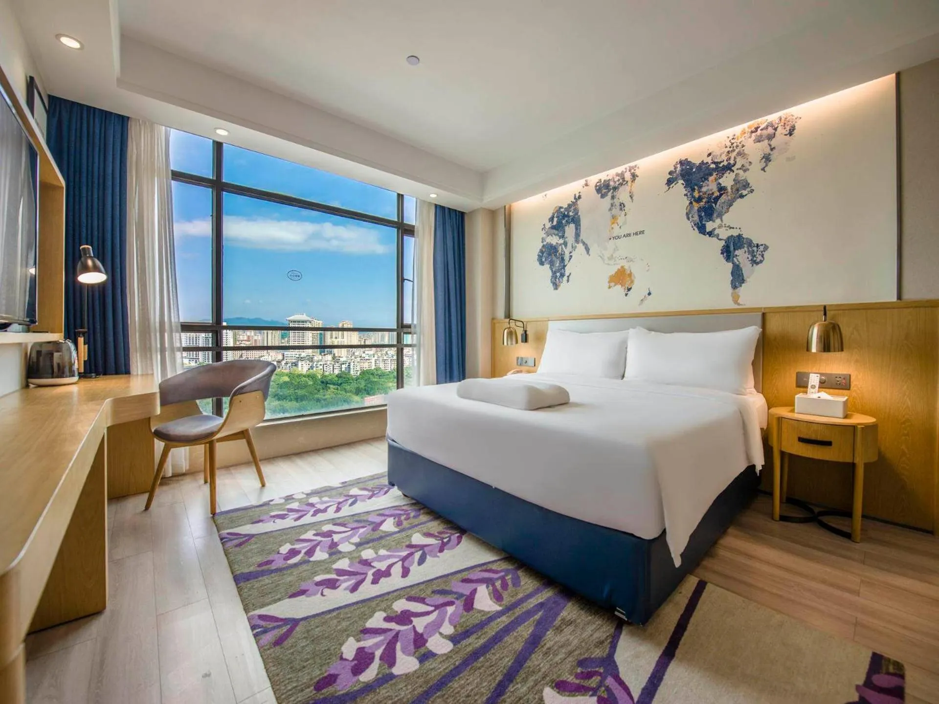 Bed in Kyriad Marvelous Hotel Qingyuan City Square