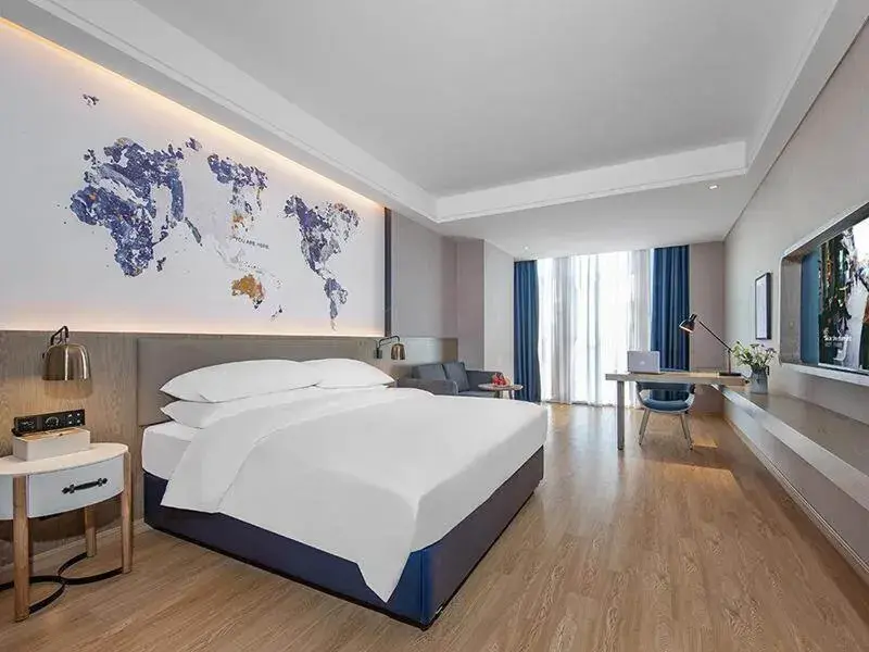 Bed in Kyriad Marvelous Hotel Huizhou Boluo Yuanzhou Bed in Kyriad Marvelous Hotel Huizhou Boluo Yuanzhou