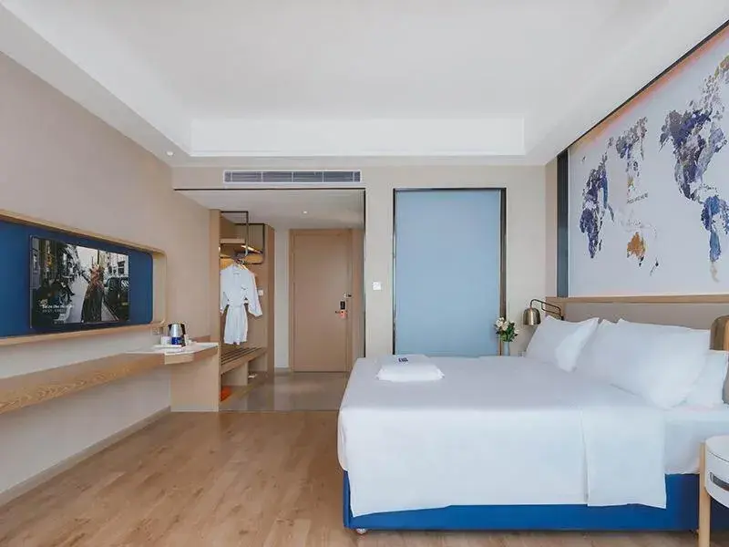 Bed in Kyriad Marvelous Hotel Huizhou Boluo Longxi Bed in Kyriad Marvelous Hotel Huizhou Boluo Longxi