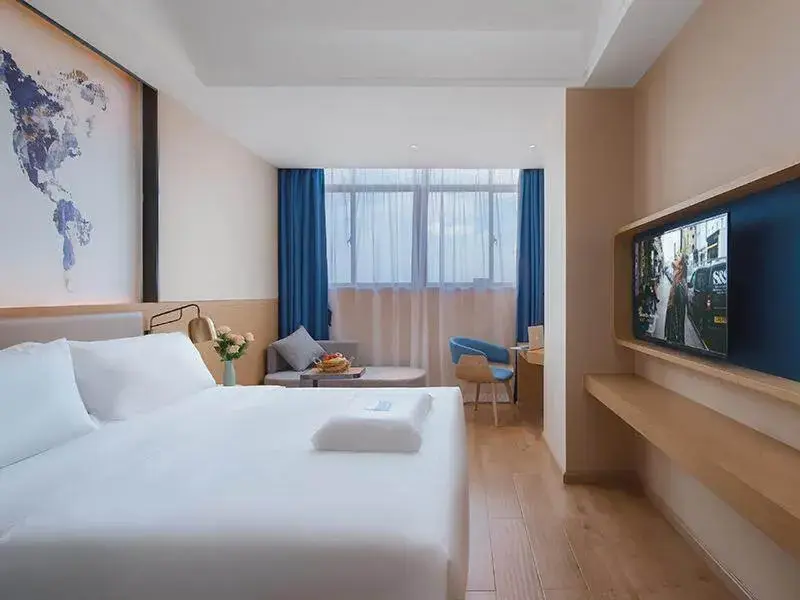 Bed in Kyriad Marvelous Hotel Huizhou Boluo Longxi Bed in Kyriad Marvelous Hotel Huizhou Boluo Longxi