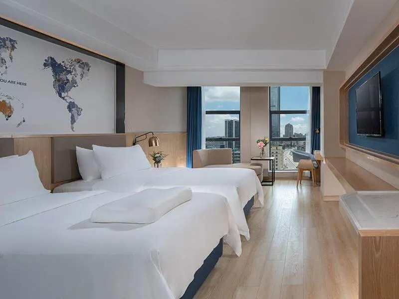Bed in Kyriad Marvelous Hotel Huizhou South Station Danshui YI Center