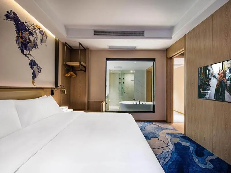 Bed in Kyriad Marvelous Hotel Haifeng